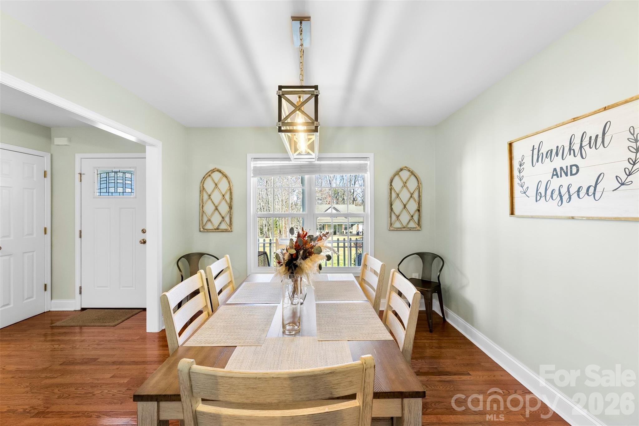 1298 Timber Spring Lane Salisbury, NC 28147 - Photo 18 of 34 a view of a livingroom with furniture window and wooden floor