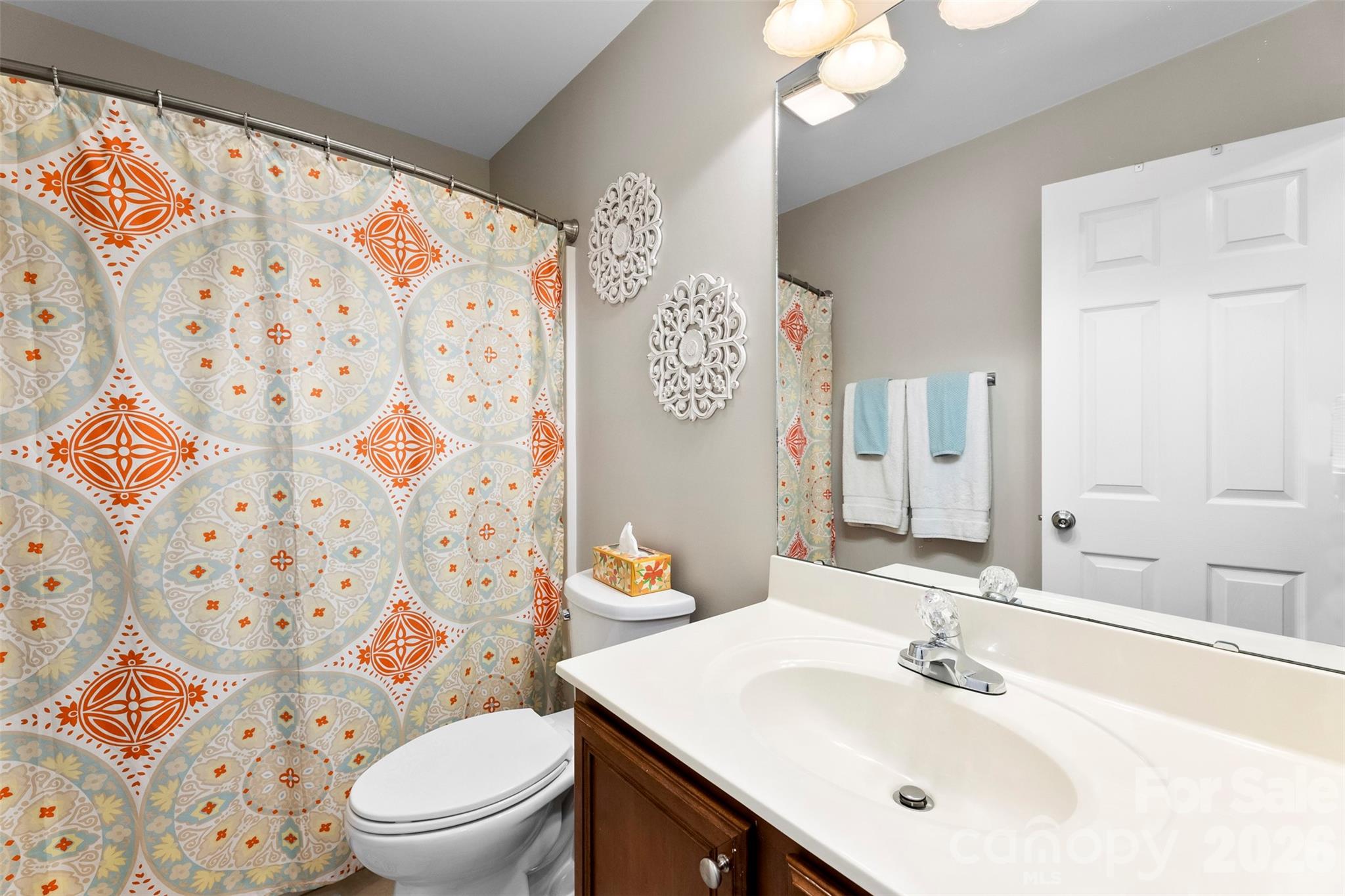 1298 Timber Spring Lane Salisbury, NC 28147 - Photo 25 of 34 a bathroom with a sink toilet and shower