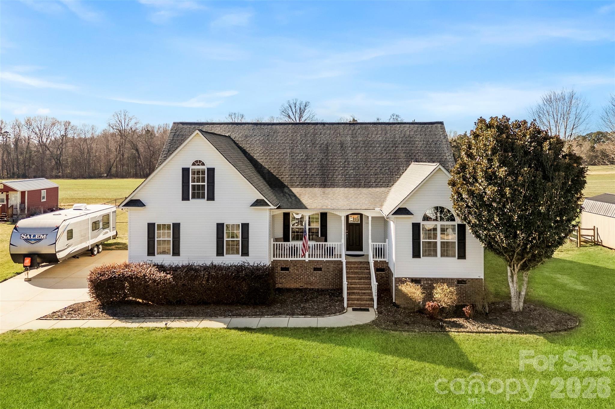 1298 Timber Spring Lane Salisbury, NC 28147 - Photo 4 of 34 a view of a house with a yard and sitting area