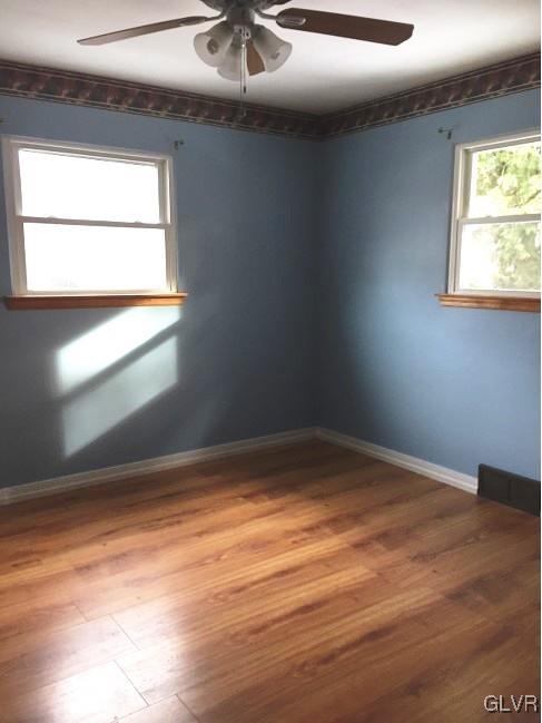 2912 Middletown Road Bethlehem, PA 18020 - Photo 3 of 17 a view of empty room with wooden floor and fan