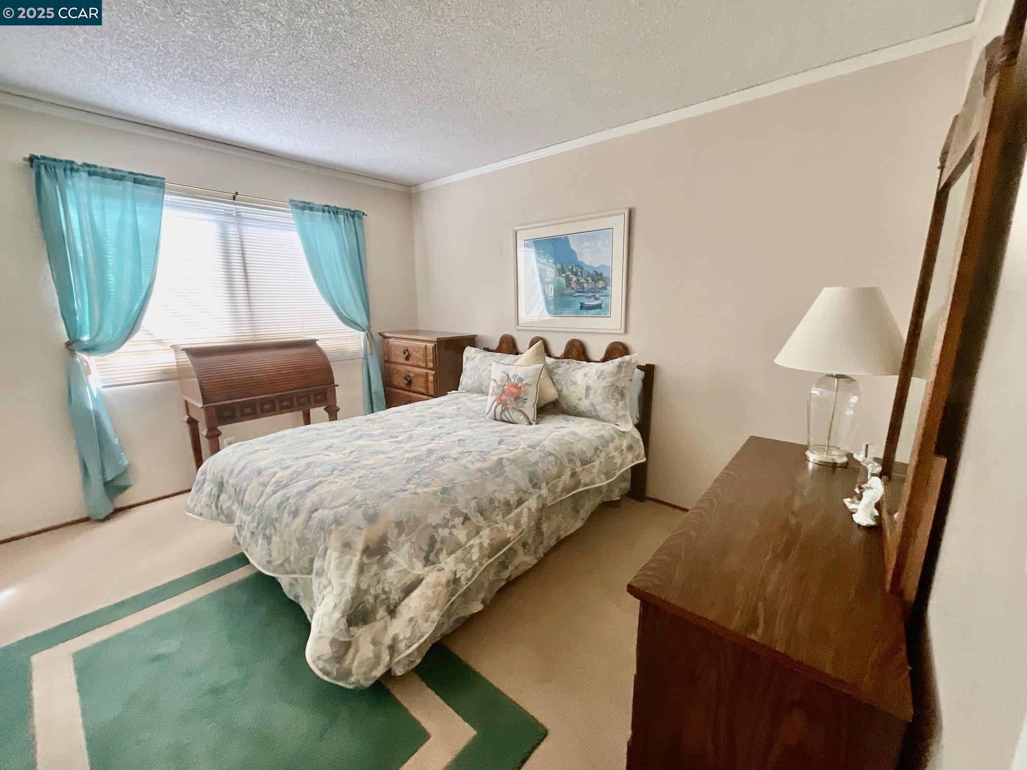 403 Gerald Court Benicia, CA 94510 - Photo 23 of 59 a bedroom with a bed and window