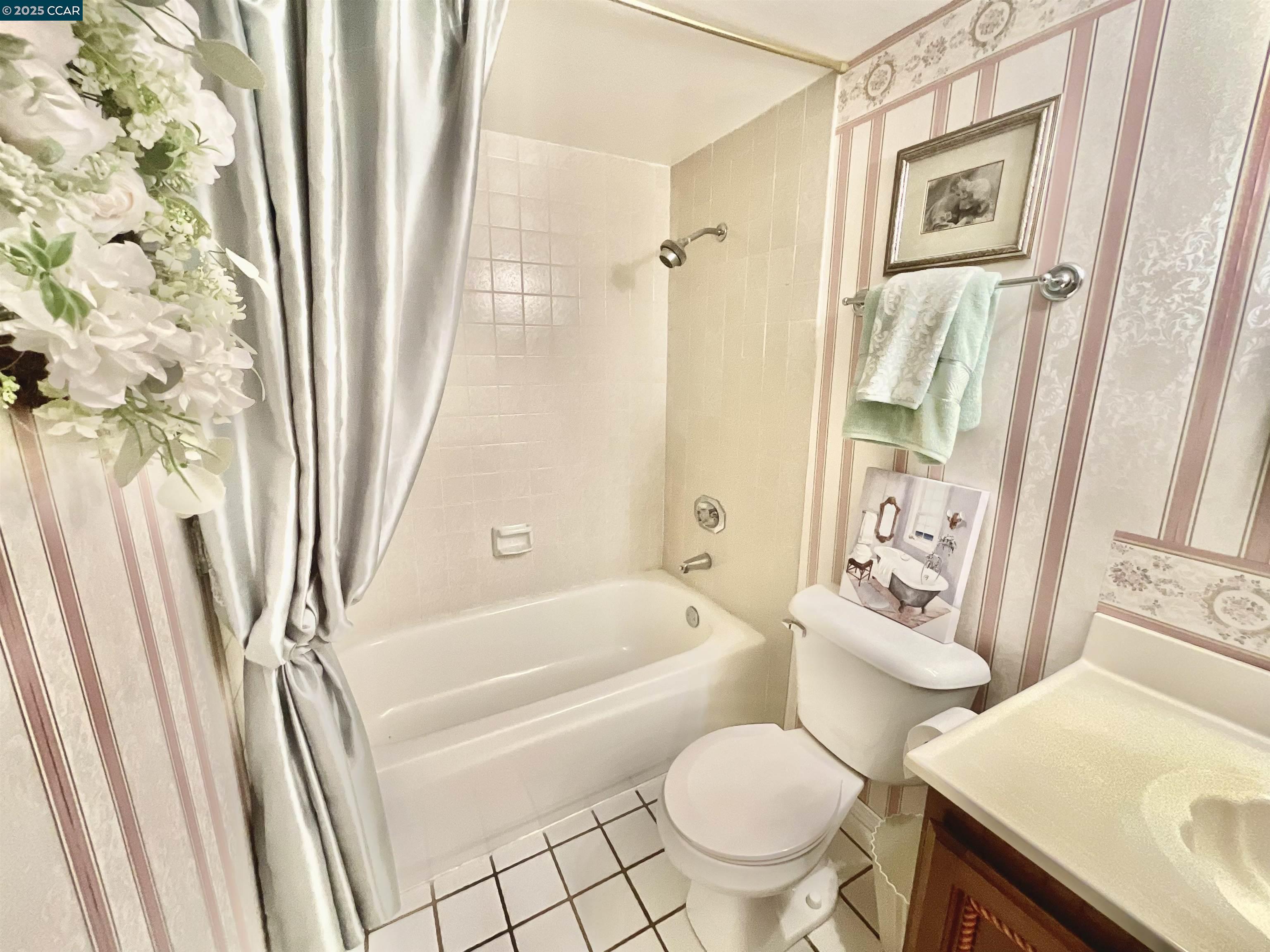 403 Gerald Court Benicia, CA 94510 - Photo 29 of 59 a bathroom with a sink toilet and shower