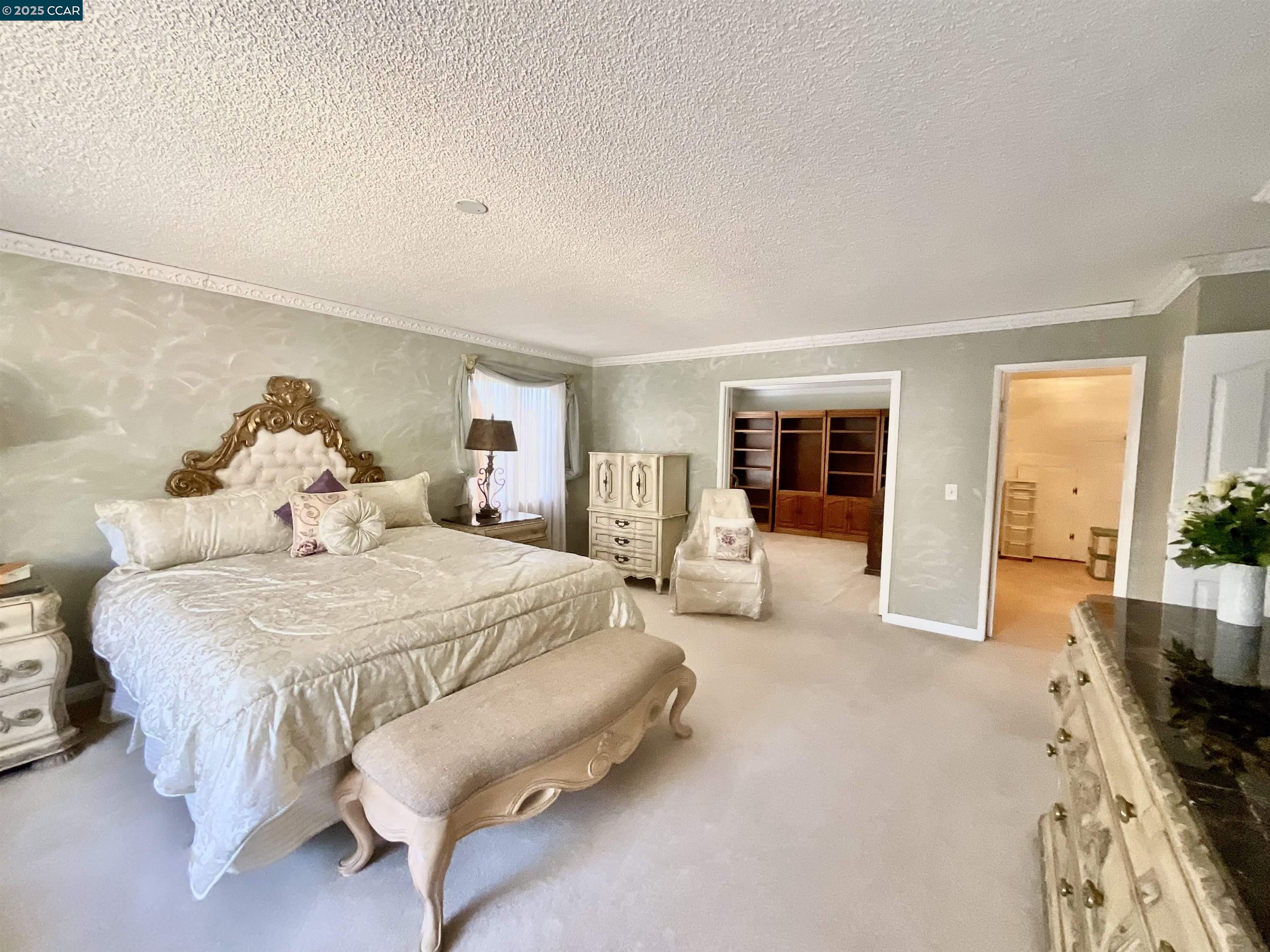 403 Gerald Court Benicia, CA 94510 - Photo 38 of 59 a spacious bedroom with a bed and large windows