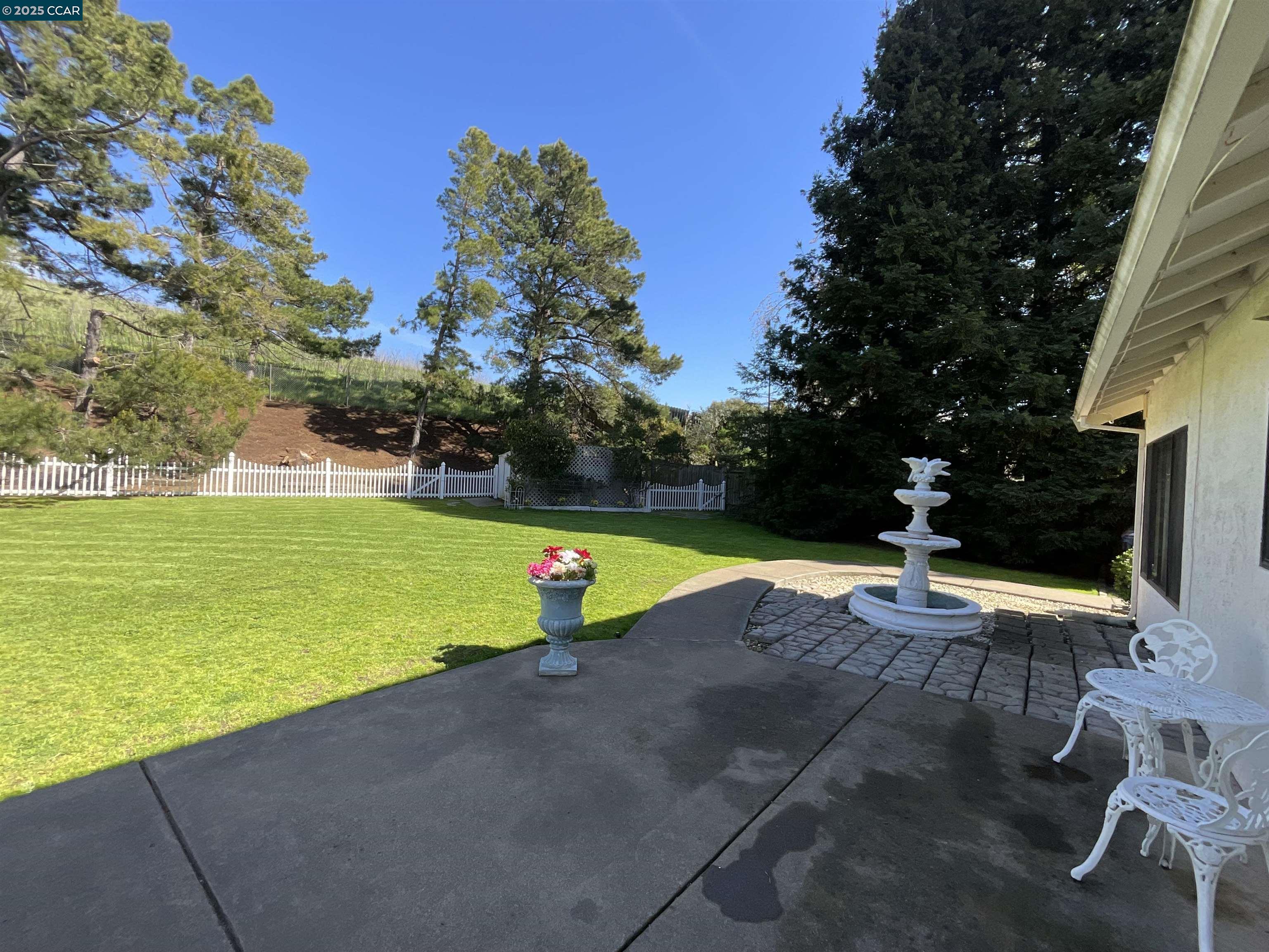 403 Gerald Court Benicia, CA 94510 - Photo 51 of 59 a view of a swimming pool with an outdoor space and seating area