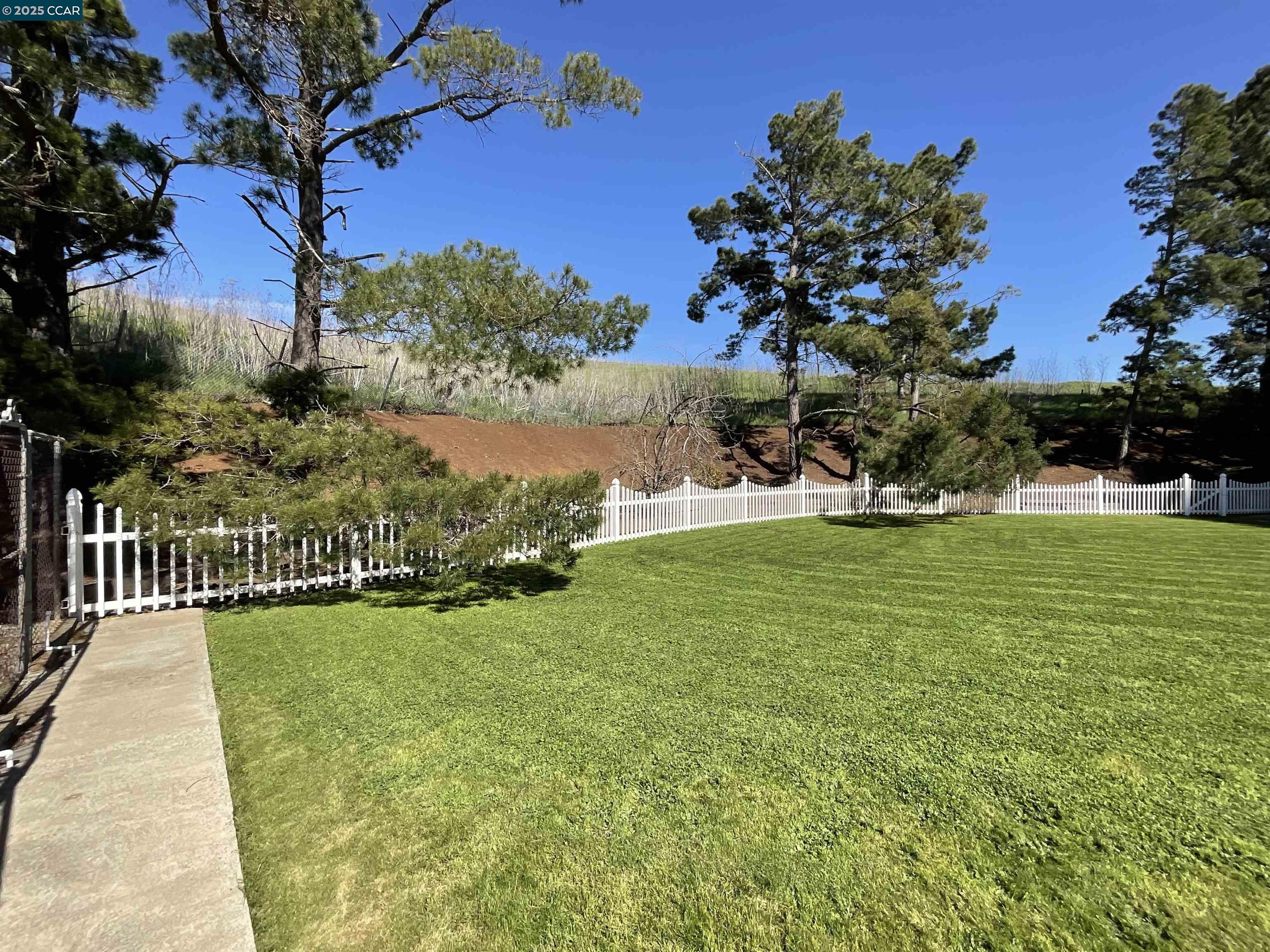 403 Gerald Court Benicia, CA 94510 - Photo 56 of 59 a view of a golf course with a garden