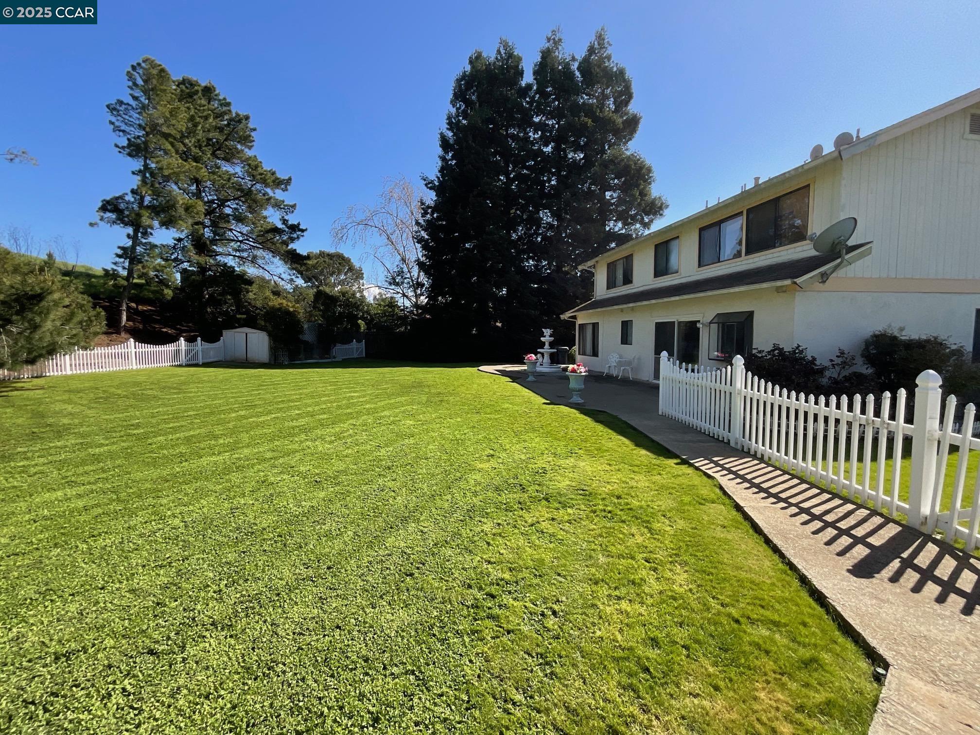 403 Gerald Court Benicia, CA 94510 - Photo 57 of 59 a view of a house with backyard and a tree