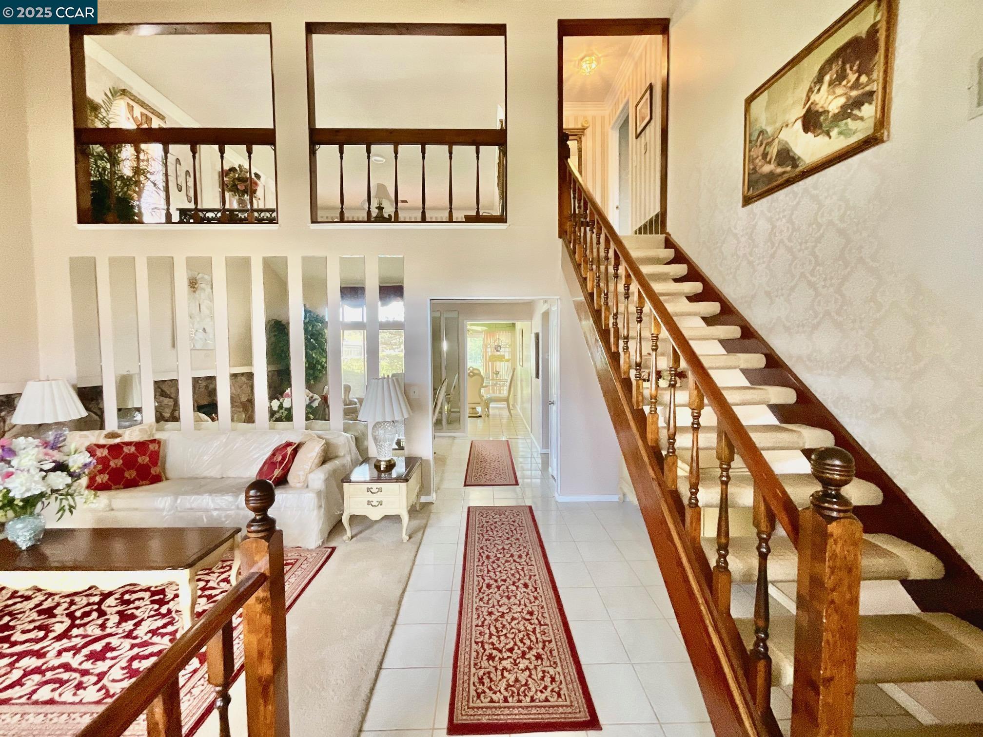 403 Gerald Court Benicia, CA 94510 - Photo 8 of 59 a balcony with wooden floor and furniture