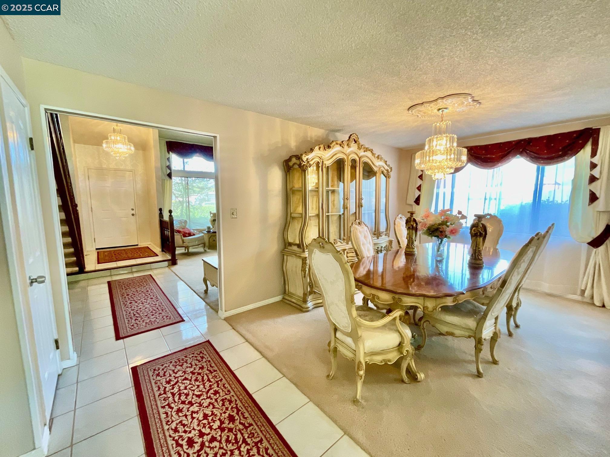 403 Gerald Court Benicia, CA 94510 - Photo 10 of 59 a view of a dining room with furniture and wooden floor