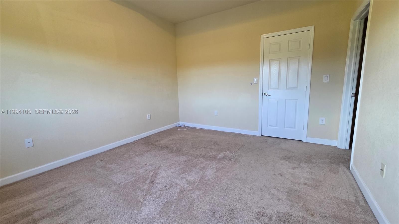 9001 Southwest 227th Street, Unit 7 Cutler Bay, FL 33190 - Photo 6 of 13 a view of an empty room