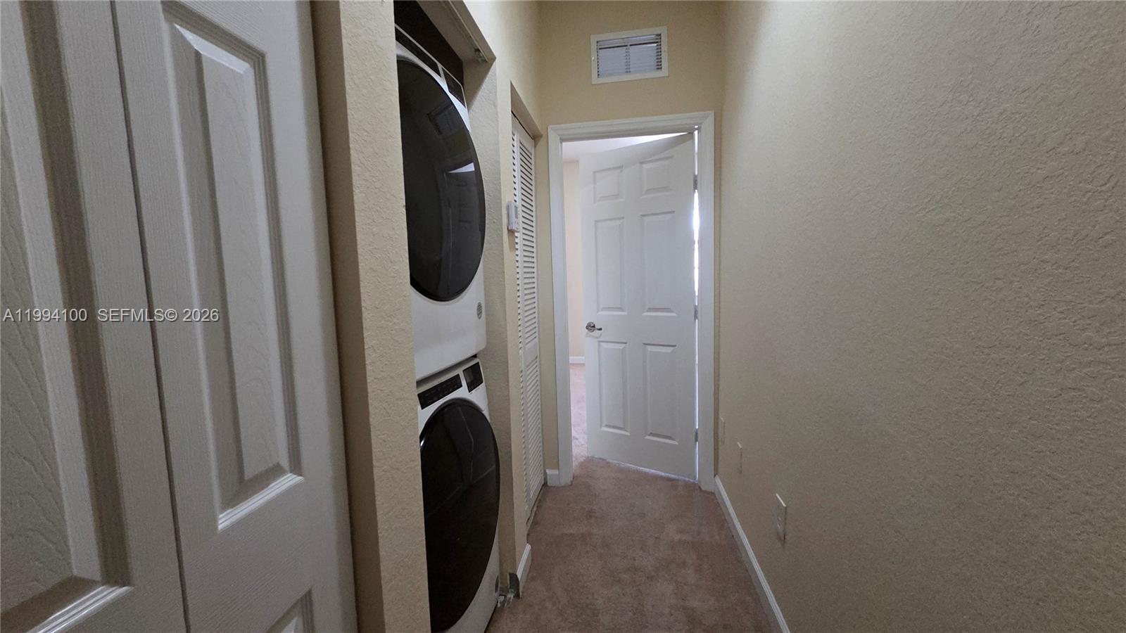 9001 Southwest 227th Street, Unit 7 Cutler Bay, FL 33190 - Photo 9 of 13 a view of walk in closet