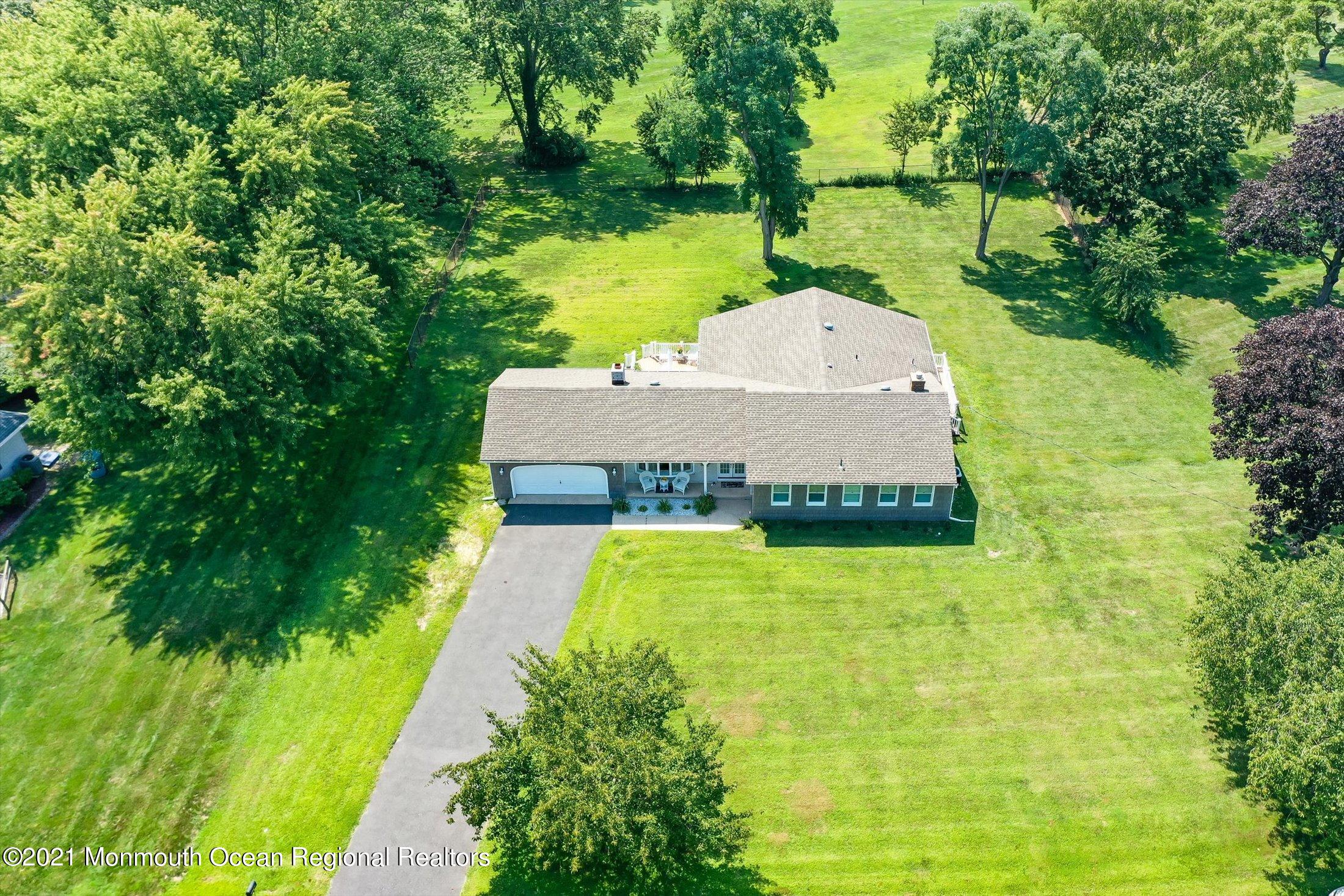 1995 Campbell Road Belmar, NJ 07719 - Photo 1 of 46 a garden view with a swimming pool