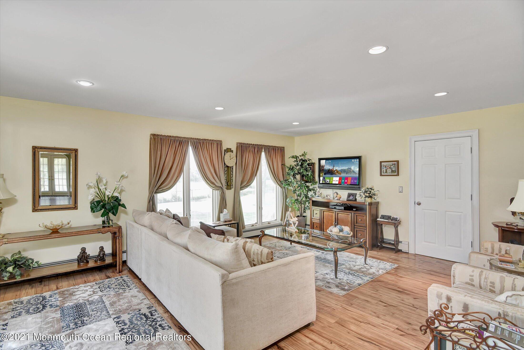 1995 Campbell Road Belmar, NJ 07719 - Photo 11 of 46 a living room with furniture and a wooden floor