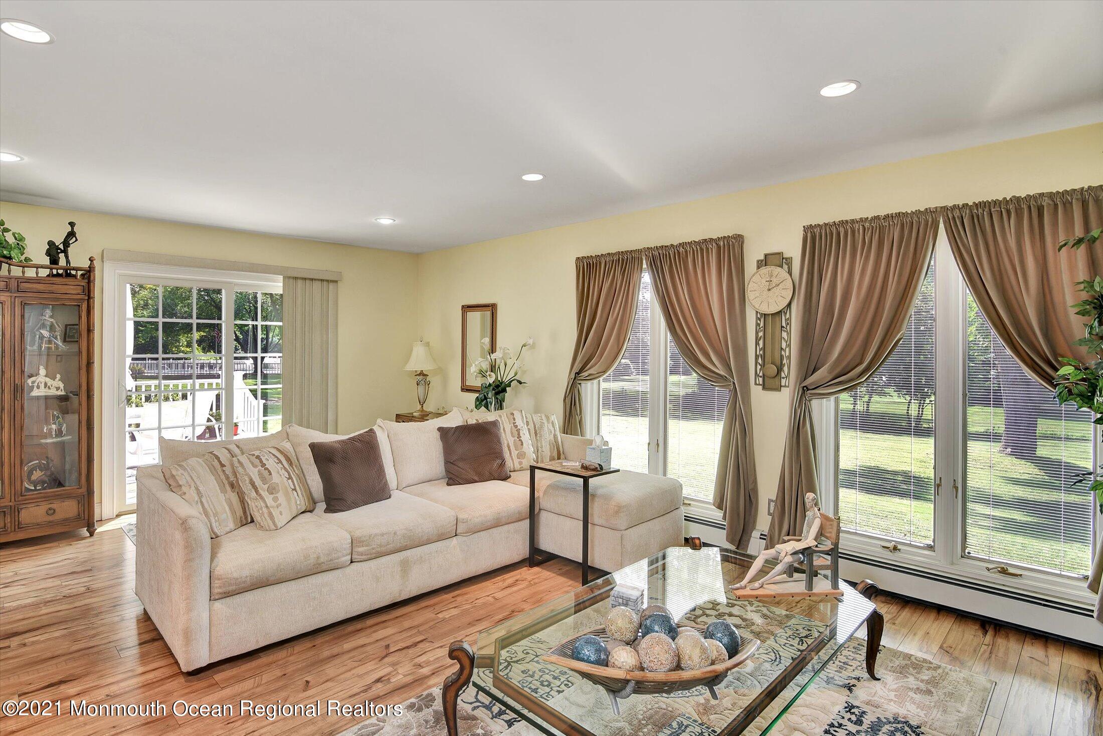 1995 Campbell Road Belmar, NJ 07719 - Photo 12 of 46 a living room with furniture and a large window