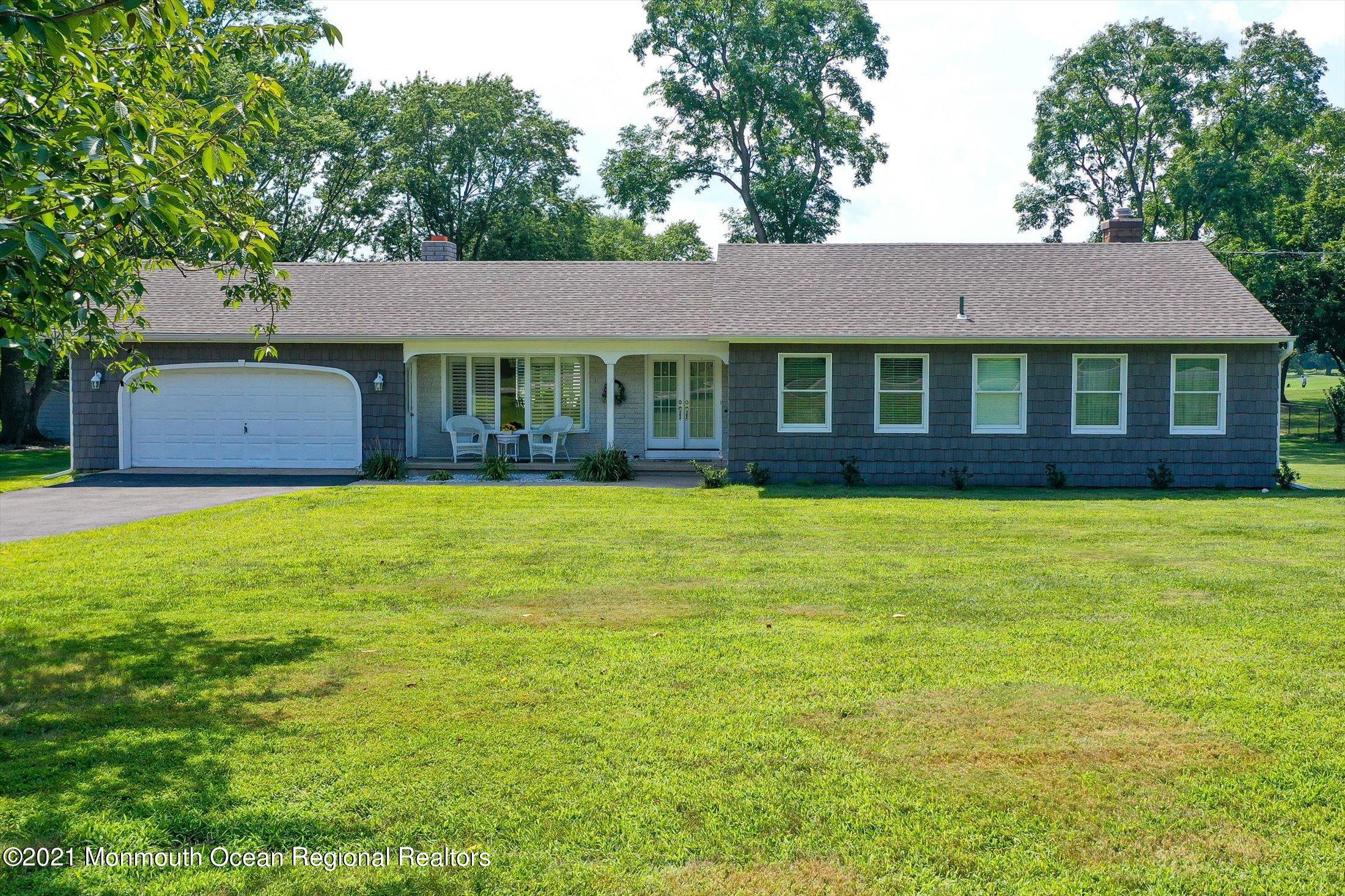 1995 Campbell Road Belmar, NJ 07719 - Photo 3 of 46 front view of a house with a yard