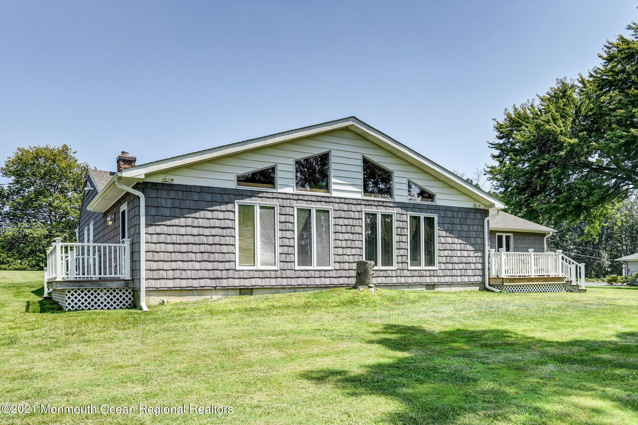 1995 Campbell Road Belmar, NJ 07719 - Photo 36 of 46 a front view of a house with a yard