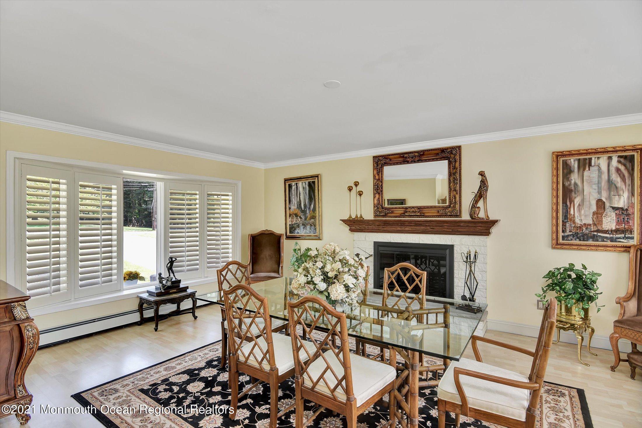 1995 Campbell Road Belmar, NJ 07719 - Photo 9 of 46 a living room with furniture a fireplace and a table