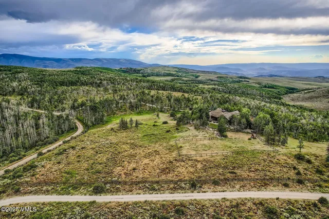 a view of a yard with an outdoor space