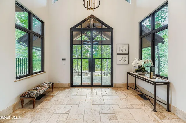 a view of a livingroom with furniture and windows
