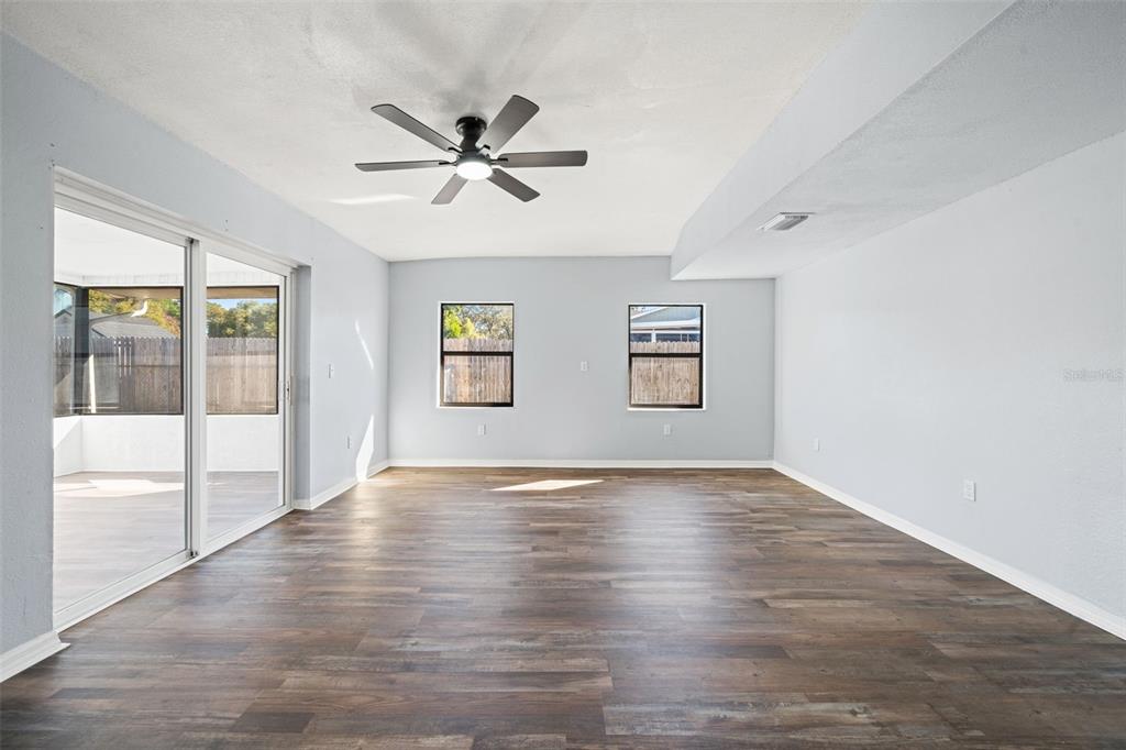 11215 Addison Street Spring Hill, FL 34609 - Photo 30 of 51 a view of an empty room with window