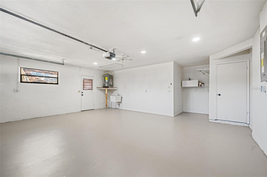 11215 Addison Street Spring Hill, FL 34609 - Photo 35 of 51 an empty room with a empty space and windows