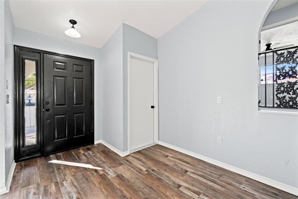 11215 Addison Street Spring Hill, FL 34609 - Photo 4 of 51 a view of empty room with closet and entryway