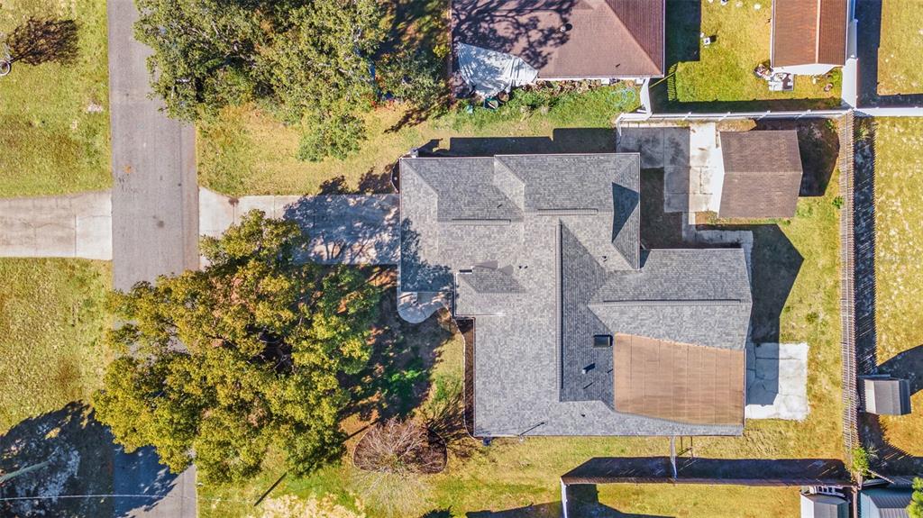 11215 Addison Street Spring Hill, FL 34609 - Photo 48 of 51 an aerial view of residential houses with outdoor space