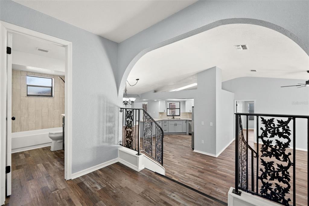 11215 Addison Street Spring Hill, FL 34609 - Photo 6 of 51 a view of entryway with wooden floor