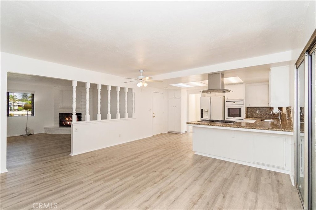 1330 La Serena Drive Glendora, CA 91740 - Photo 12 of 36 a view of a kitchen with wooden floor and a kitchen