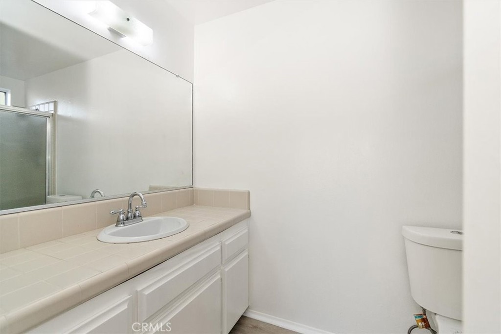 1330 La Serena Drive Glendora, CA 91740 - Photo 22 of 36 a bathroom with a sink and a mirror