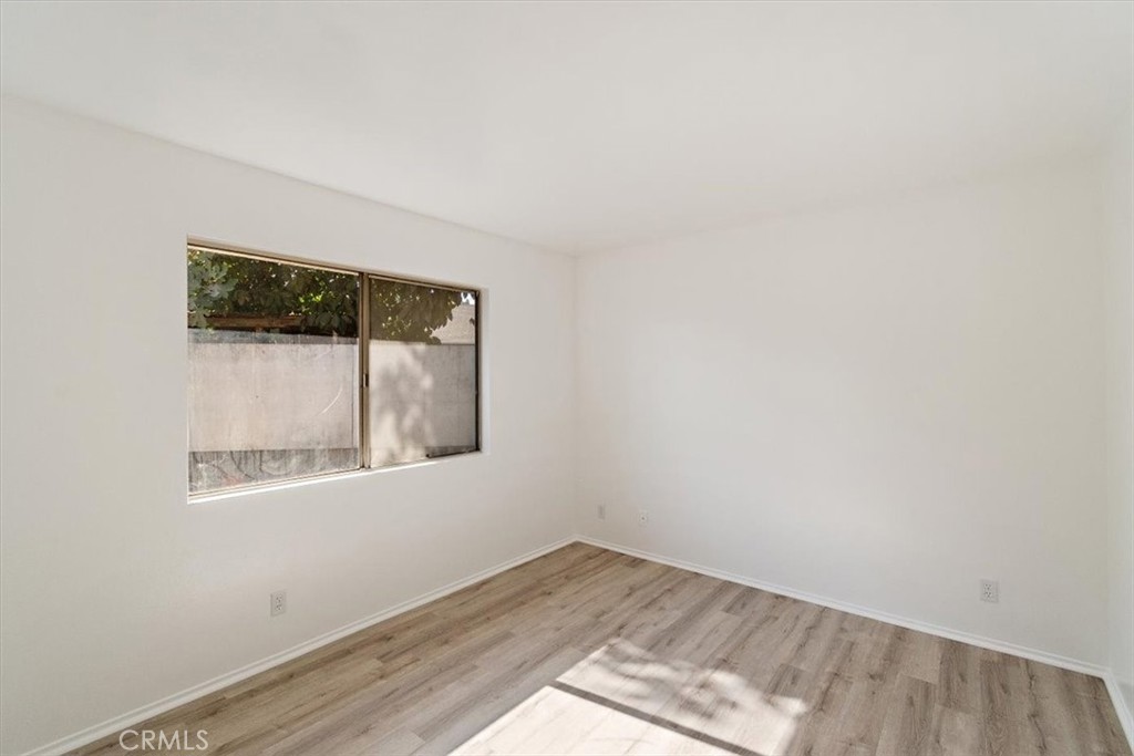 1330 La Serena Drive Glendora, CA 91740 - Photo 26 of 36 a view of an empty room with wooden floor and a window