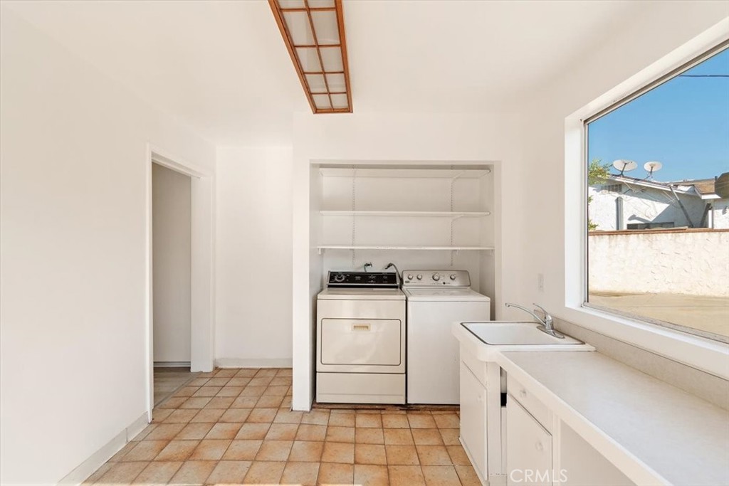 1330 La Serena Drive Glendora, CA 91740 - Photo 28 of 36 a kitchen with a stove a sink and a window