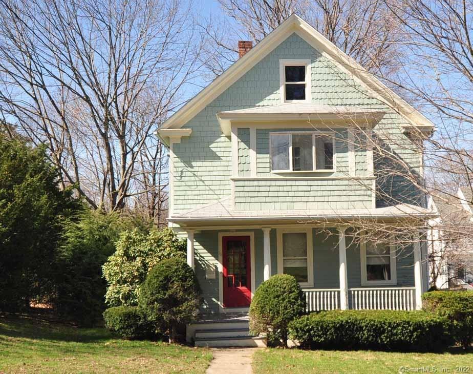 18 Warren Way Watertown, CT 06795 - Photo 1 of 1 a front view of a house with garden