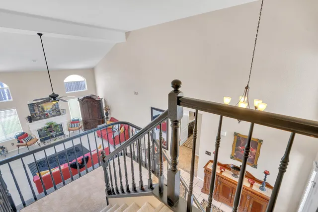 a view of entryway with stairs and wooden floor