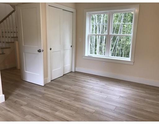 32 Pleasant View Drive Little Compton, RI 02837 - Photo 17 of 37 an empty room with wooden floor and windows