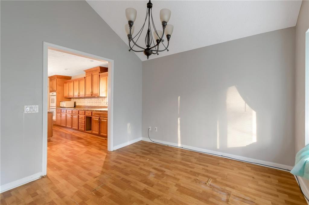 3523 Liberty Ridge Trail Marietta, GA 30062 - Photo 12 of 25 a view of a room with wooden floor and windows