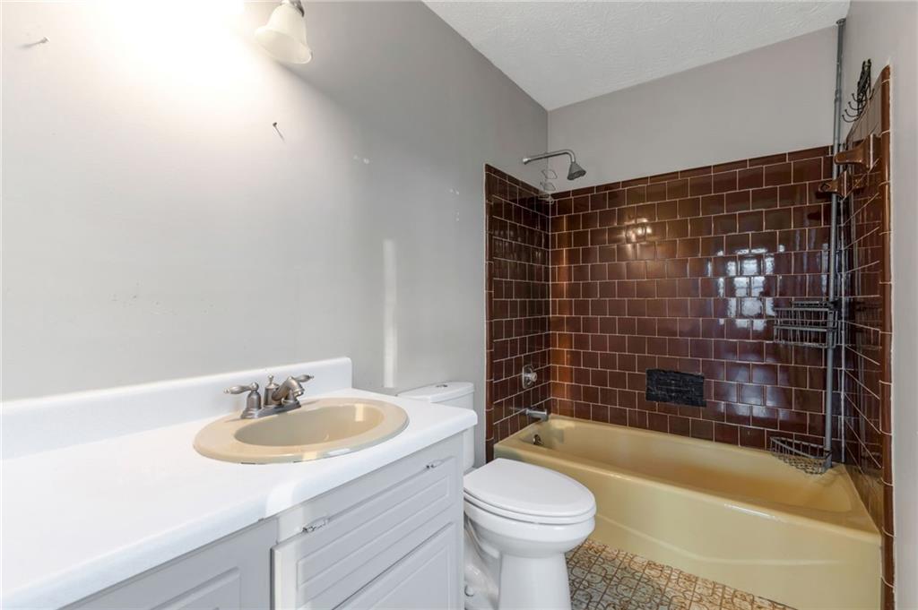 3523 Liberty Ridge Trail Marietta, GA 30062 - Photo 20 of 25 a bathroom with a sink toilet and shower