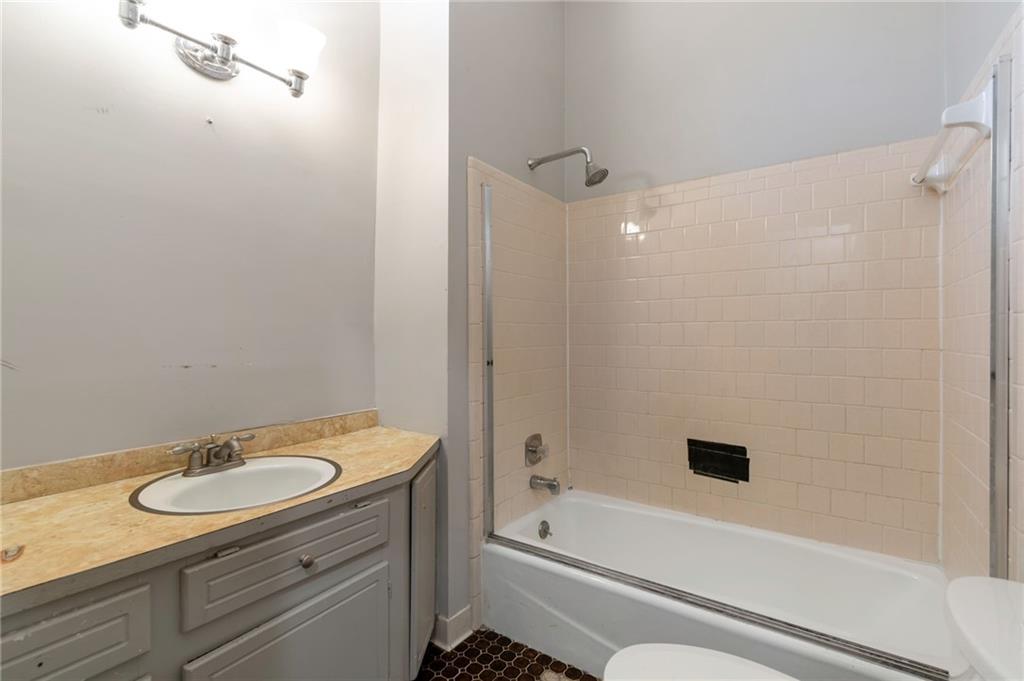3523 Liberty Ridge Trail Marietta, GA 30062 - Photo 23 of 25 a bathroom with a granite countertop sink toilet and shower