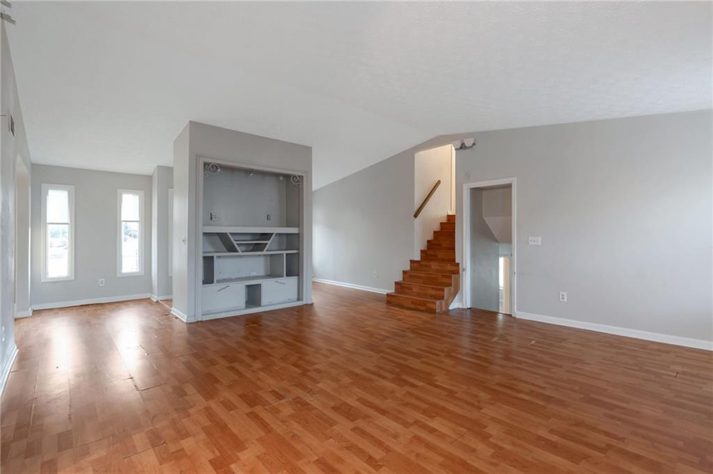 3523 Liberty Ridge Trail Marietta, GA 30062 - Photo 8 of 25 a view of a kitchen with wooden floor and a kitchen