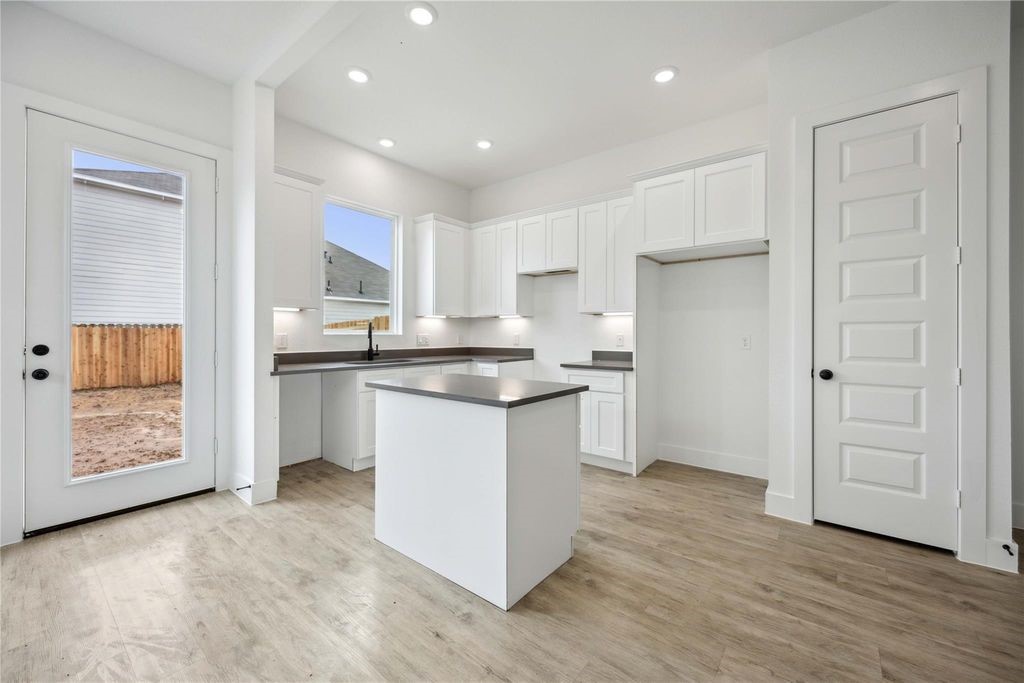 8103 Calhoun Road Houston, TX 77051 - Photo 19 of 29 a kitchen with stainless steel appliances granite countertop a refrigerator and a stove top oven