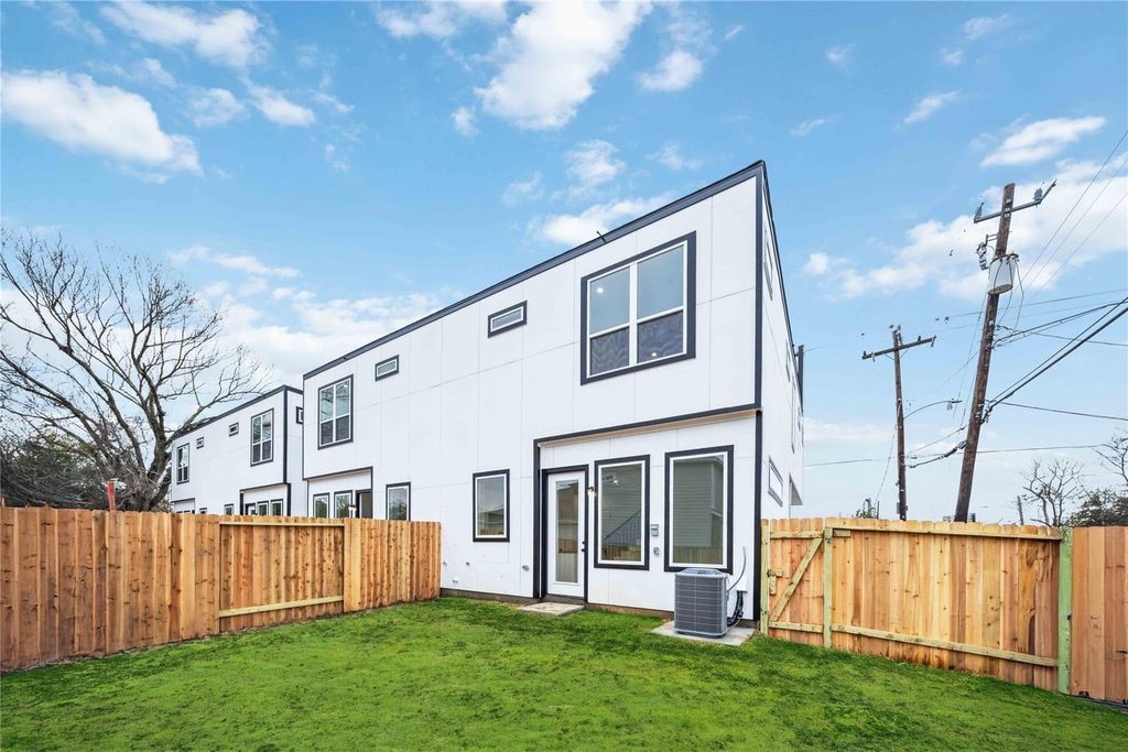 8103 Calhoun Road Houston, TX 77051 - Photo 25 of 29 a view of a house with backyard and wooden fence