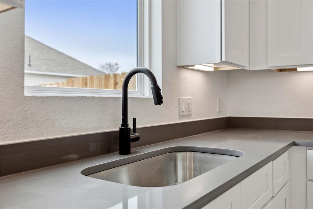 8103 Calhoun Road Houston, TX 77051 - Photo 6 of 29 a close view of sink and tap