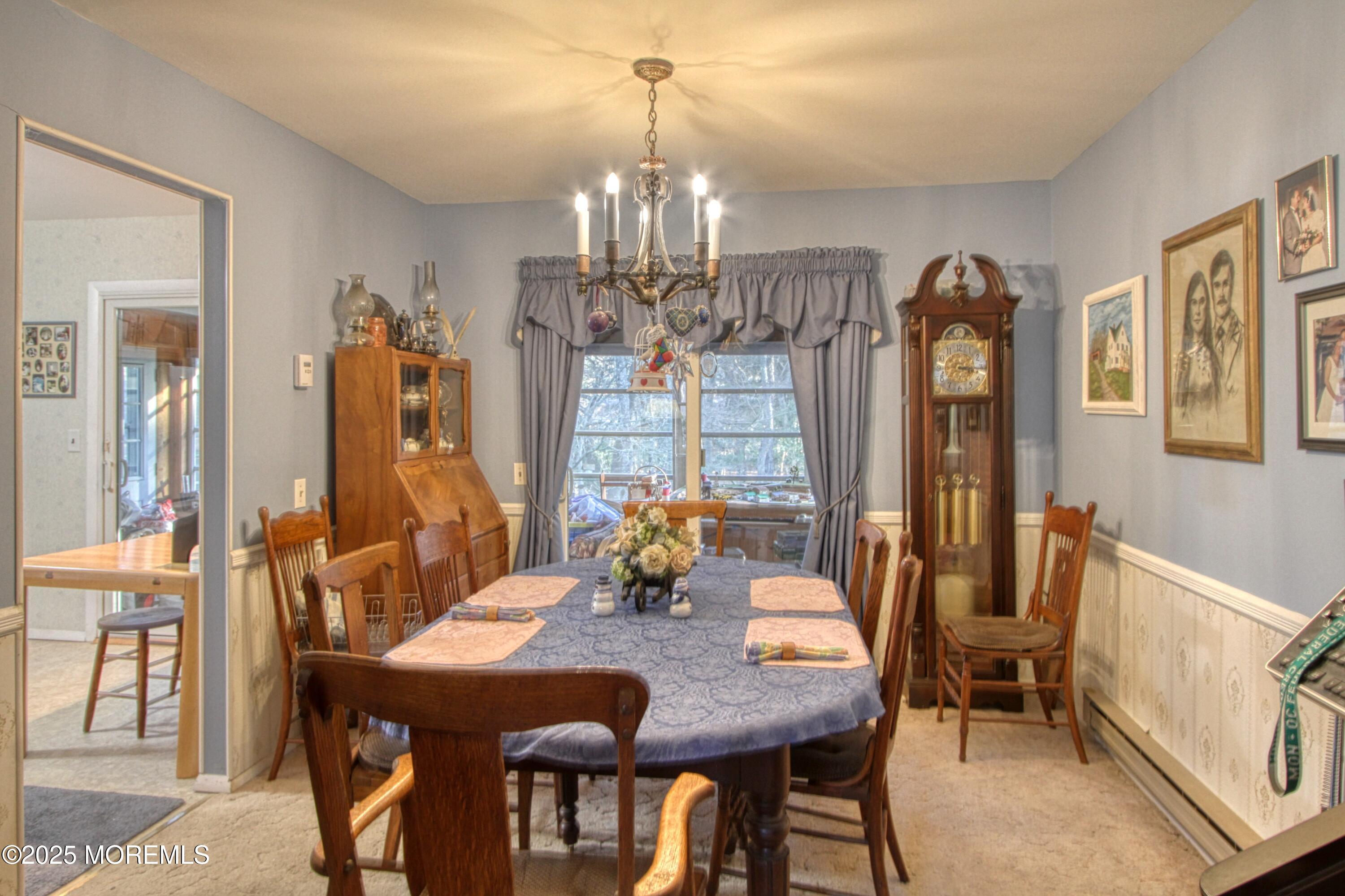 9 Greenleaf Street Whiting, NJ 08759 - Photo 5 of 16 a view of a dining room with furniture and chandelier