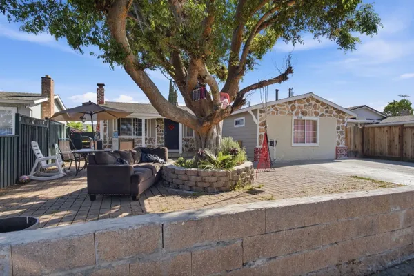 a front view of a house with entertaining space