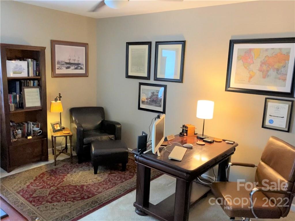 239 Elrosa Road Mooresville, NC 28115 - Photo 15 of 25 a living room with furniture and a rug