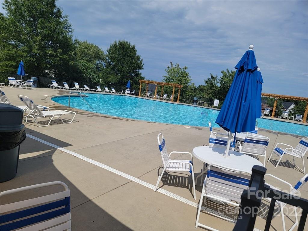 239 Elrosa Road Mooresville, NC 28115 - Photo 24 of 25 a view of a chairs and table in patio