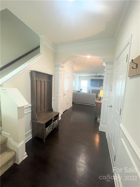 239 Elrosa Road Mooresville, NC 28115 - Photo 10 of 25 a view of a hallway with entryway wooden floor and windows