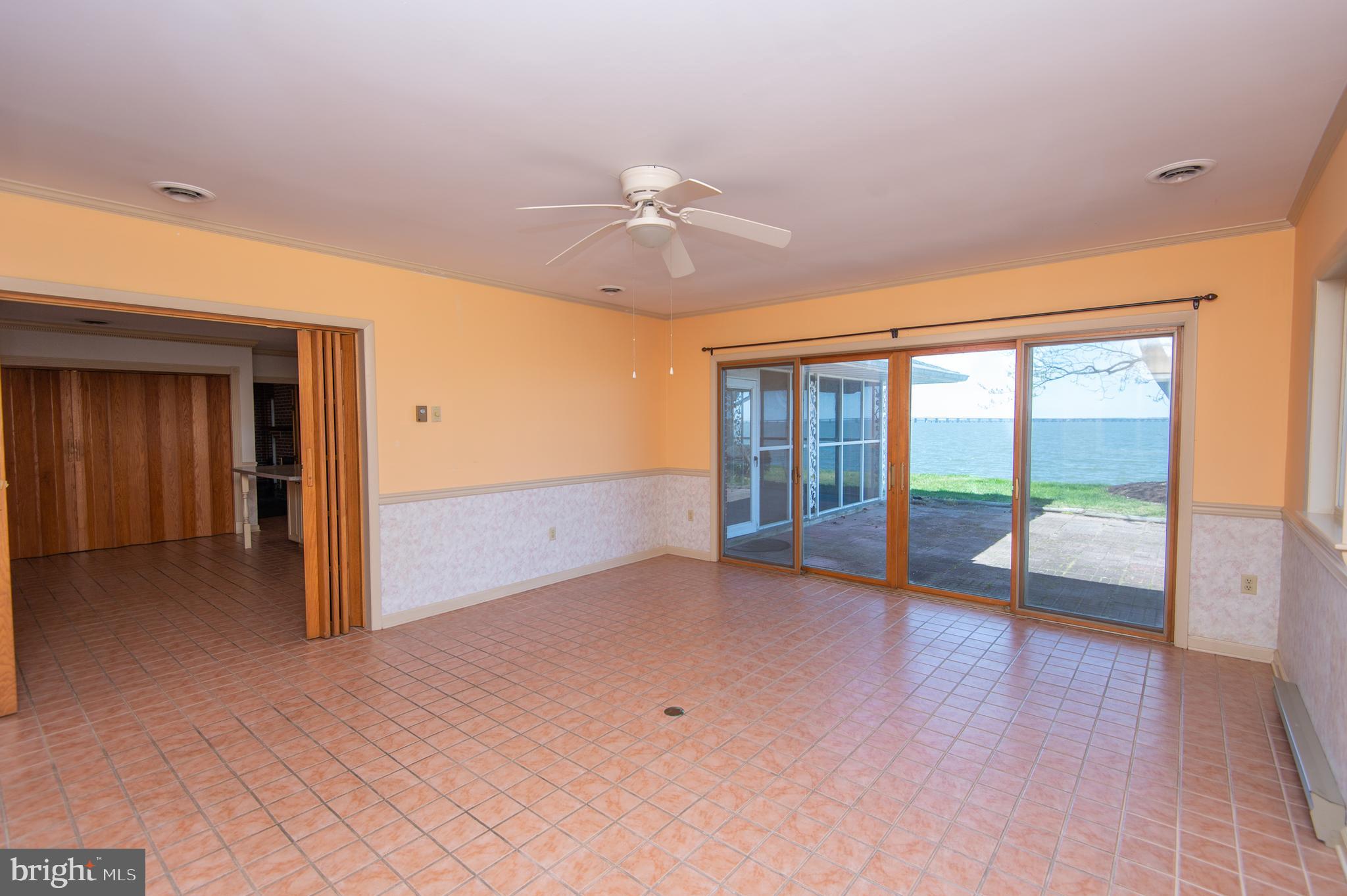 5452 Tates Bank Road Cambridge, MD 21613 - Photo 12 of 64 Dining Room with slider to patio