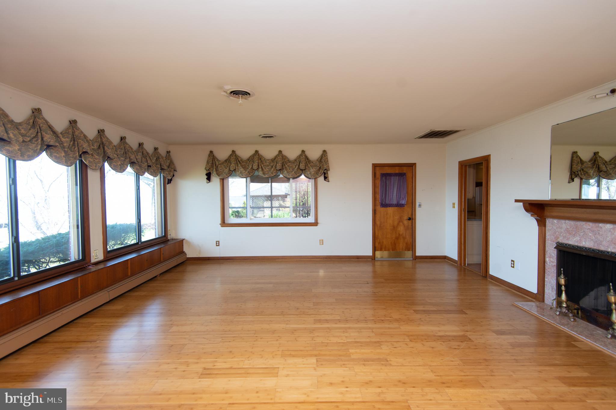 5452 Tates Bank Road Cambridge, MD 21613 - Photo 20 of 64 Living Room opens to Screened Porch