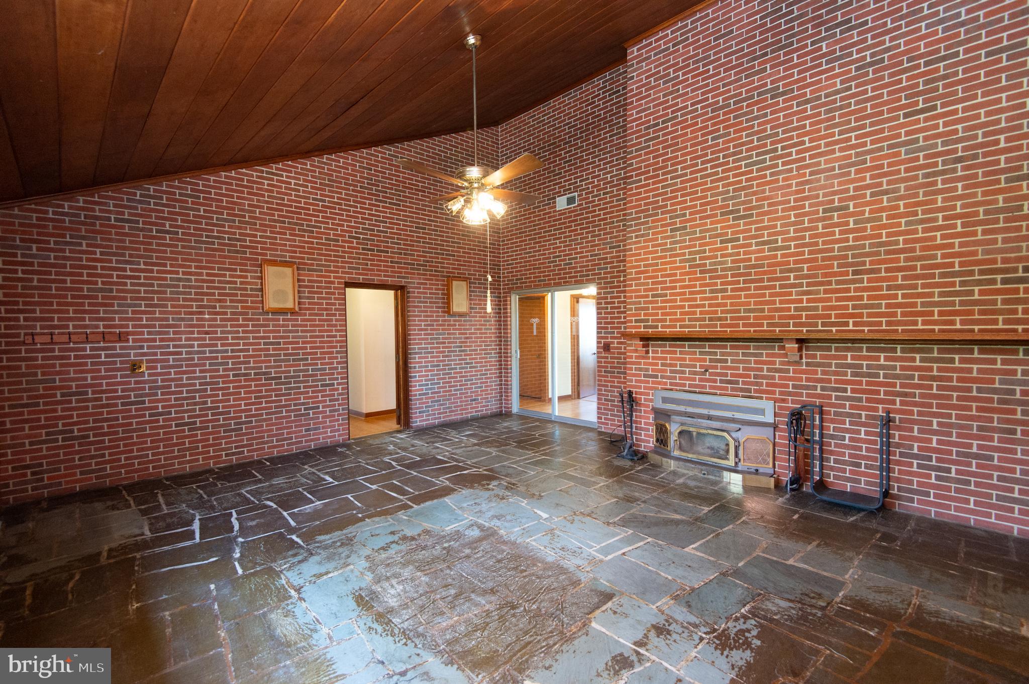 5452 Tates Bank Road Cambridge, MD 21613 - Photo 4 of 64 Family Room with Slate Floor