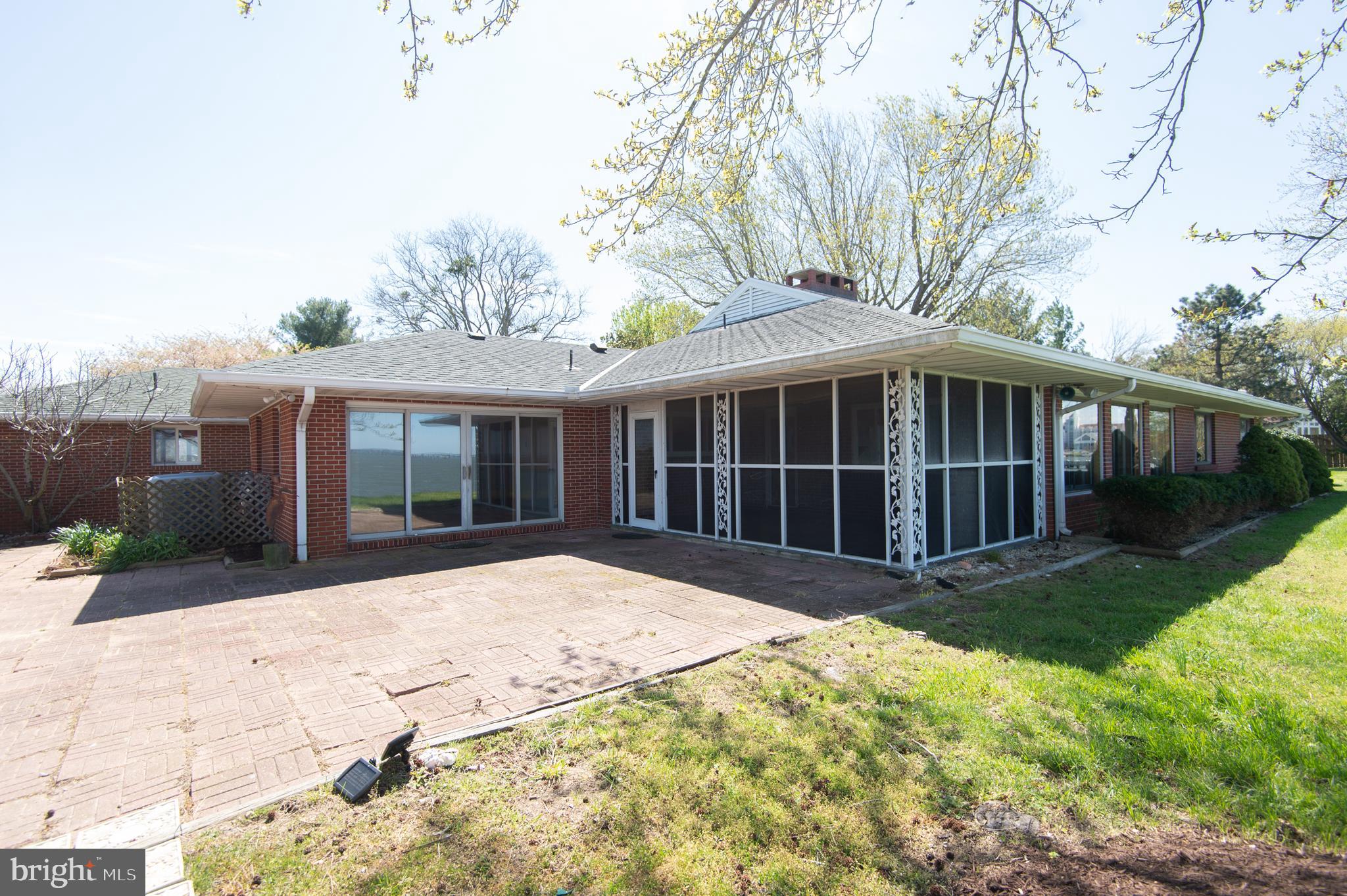 5452 Tates Bank Road Cambridge, MD 21613 - Photo 40 of 64 Patio, Screen porch, and DR slider